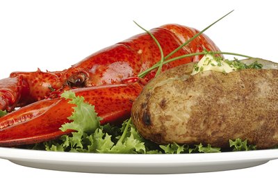 Hemera Technologies/PhotoObjects.net/Getty Images Lobster is naturally high in cholesterol.