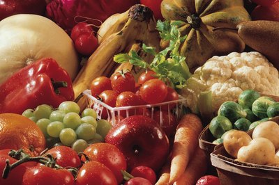 Comstock/Comstock/Getty Images Women need 1.5 cups of fruit and 2.5 cups of vegetables each day.