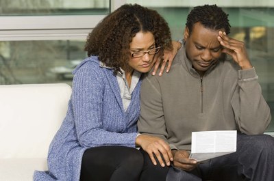 Jupiterimages/Stockbyte/Getty Images Unpaid property taxes can lead to foreclosure, but there are several ways to protect your investment.