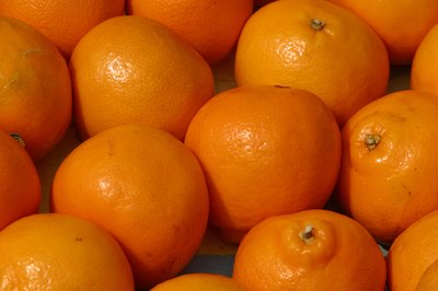 Hemera Technologies/AbleStock.com/Getty Images Oranges are high in vitamin C and potassium.