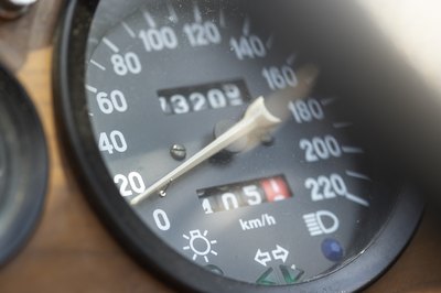 Jupiterimages/Photos.com/Getty Images Buying a high-mileage car requires effort on your part to ensure a good purchase.