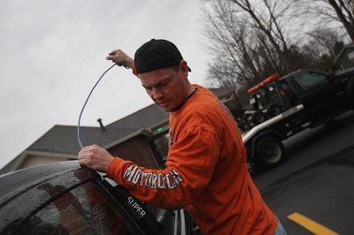 John Moore/Getty Images News/Getty Images A visit from the repo man won't make your day.