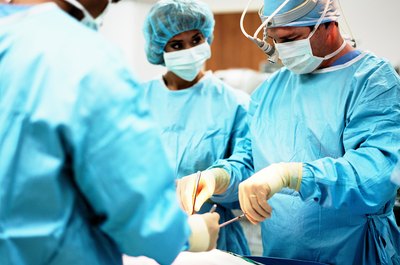 Jupiterimages/Photos.com/Getty Images Surgical technologists must be team players.