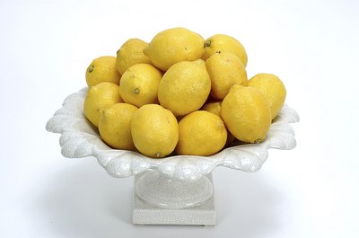 Photos.com/AbleStock.com/Getty Images Lemons are deliciously sour, and may be able to keep your kidneys healthy.