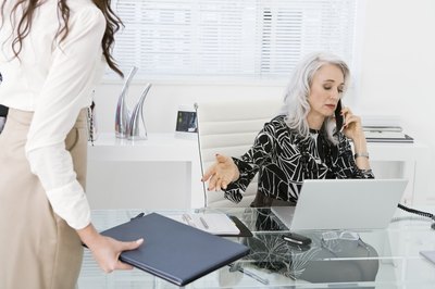 Jupiterimages/Pixland/Getty Images A career objective helps you land an administrative job that is specific to your skills.