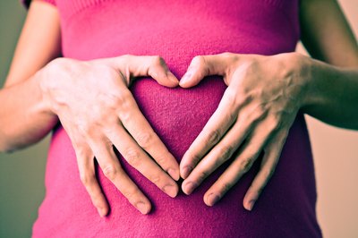 Jupiterimages/Photos.com/Getty Images Being without health insurance adds to the worries of pregnancy.