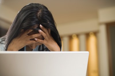 Jupiterimages, Brand X Pictures/Brand X Pictures/Getty Images Having an electronic filing system in place can prevent unnecessary frustration.