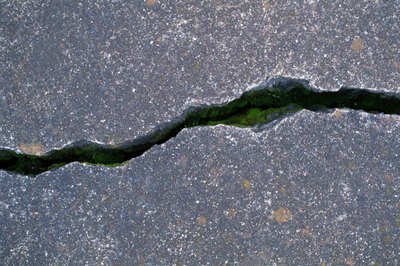 Thinkstock Images/Comstock/Getty Images Even if your walls are cracking, homeowners insurance may not help.