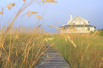 Jupiterimages/Comstock/Getty Images Your vacation home could qualify you for extra tax deductions.