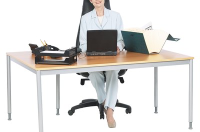 Hemera Technologies/PhotoObjects.net/Getty Images You might get the new computer if you're on the job longer than anyone else.