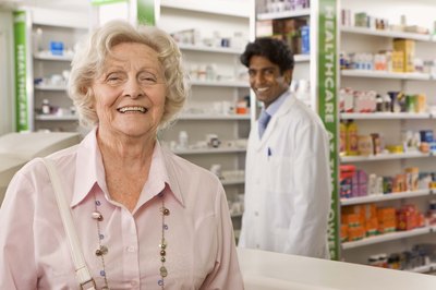 Jupiterimages/Polka Dot/Getty Images Your pharmacist might know how you can get free or low-cost medications.