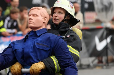 Adam Berry/Getty Images News/Getty Images Female firefighters practice and train alongside the men.