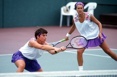J.D. Cuban/Getty Images Sport/Getty Images Winning doubles teams are able to control the net.