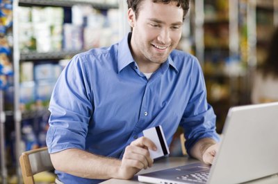 Jupiterimages/Brand X Pictures/Getty Images Lowering credit card interest rates can make life much easier.