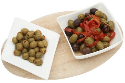 PhotoObjects.net/PhotoObjects.net/Getty Images Stuffed olives contain heart-healthy fats and beneficial antioxidants.