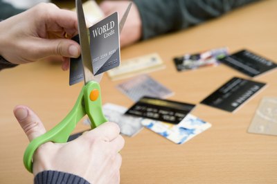 Jupiterimages/Comstock/Getty Images Track your credit-card debt payoff using a debt goal chart.