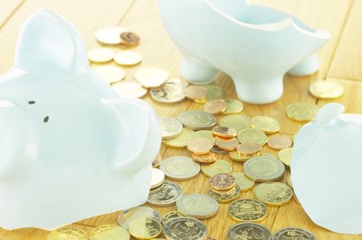 Hemera Technologies/AbleStock.com/Getty Images Pick up the pieces and repair your finances.