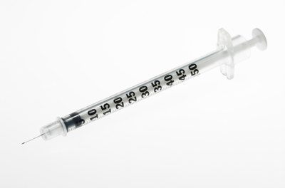 Creatas/Creatas/Getty Images Injections can't help your diabetic cat if he is insulin resistant.