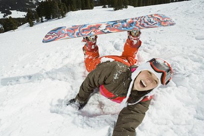 Brand X Pictures/Brand X Pictures/Getty Images Toe drag can result in a quick spill on your snowboard.