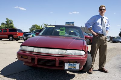 Creatas/Creatas/Getty Images Used-car buyers should get a tune-up and an inspection before driving.