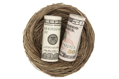 Thomas Northcut/Photodisc/Getty Images Both 401ks and Roth IRAs can play a role in your retirement planning.