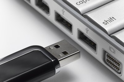 Jeffrey Hamilton/Digital Vision/Getty Images Flash drives can introduce viruses into company's computer systems.