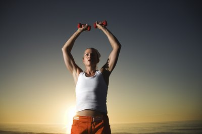 Jupiterimages/Comstock/Getty Images Dumbbell complexes are intense but rewarding for weight loss.