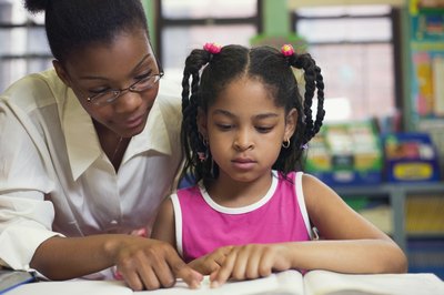 Creatas/Creatas/Getty Images Resource teachers work closely with individual students.