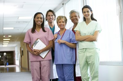 BananaStock/BananaStock/Getty Images Advanced information technology and an aging population segment aged 65 and older contribute to the growing demand for nursing jobs.