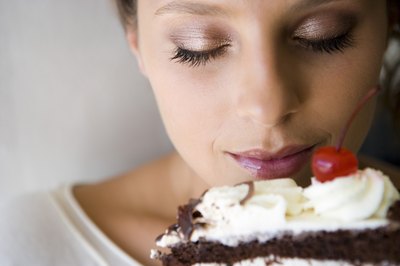 Jupiterimages/Pixland/Getty Images Stay away from carb-laden foods and the temptations will ease.