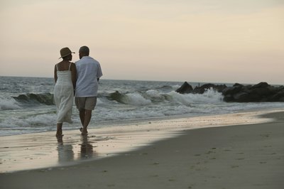 Comstock Images/Comstock/Getty Images Joint ownership is a popular way for couples to own stock together.