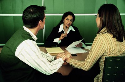 Creatas/Creatas/Getty Images The court system uses intrepreters to relay information.