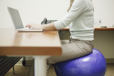 How To Sit On An Exercise Ball At A Desk Woman