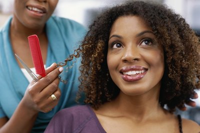George Doyle/Stockbyte/Getty Images A happy hairstylist will embrace his work environment.
