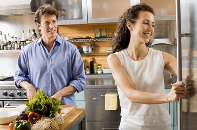 Jupiterimages/Creatas/Getty Images A sudden loss of income can affect your loan payments.