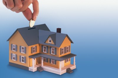 Comstock/Comstock/Getty Images Biweekly mortgage payments save interest.