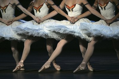 Christopher Furlong/Getty Images Entertainment/Getty Images Ballet training builds lower leg strength without adding bulk..