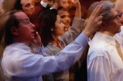 Ryan McVay/Photodisc/Getty Images Stock traders establish prices based on opinions.