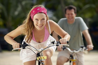 Goodshoot RF/Goodshoot/Getty Images Bicycling raises your metabolic rate for almost a day.