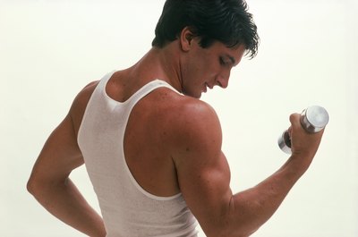 Jupiterimages/Photos.com/Getty Images Biceps are needed for the arm action that allows sprinters to run faster.