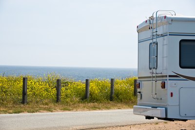 Jupiterimages/Photos.com/Getty Images If you refinance your camper, you may hit the road with more money in your pocket.