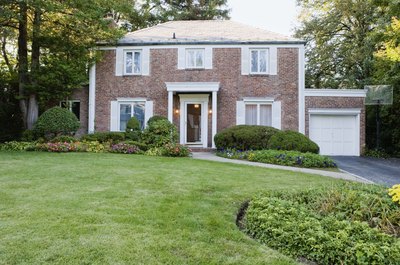 Jupiterimages/Creatas/Getty Images When you pay property tax, it's a potential itemized deduction.