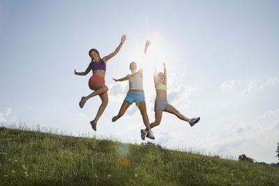 Jupiterimages/Brand X Pictures/Getty Images Burn fat and build bones with high-impact aerobics.