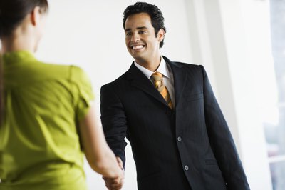Brand X Pictures/Brand X Pictures/Getty Images Walk in with confidence and have a firm handshake.