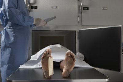 Darrin Klimek/Digital Vision/Getty Images Morticians temporarily preserve the deceased through embalming.