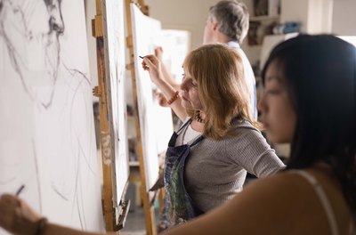 Jupiterimages/BananaStock/Getty Images Artistic people like to work with ideas and things, according to Purdue University.