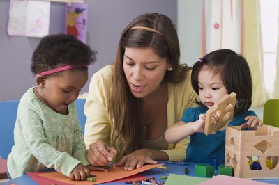 Jupiterimages/Comstock/Getty Images Although child care can be costly, financial help is available.