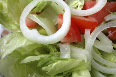 Ablestock.com/AbleStock.com/Getty Images A salad is one unprocessed lunch option.