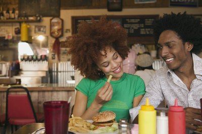 Brand X Pictures/Brand X Pictures/Getty Images Eating out isn't necessarily a budget-breaker.