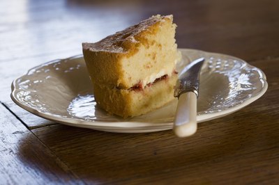 Jupiterimages/Goodshoot/Getty Images Cakes and other highly refined foods are quite acidic.